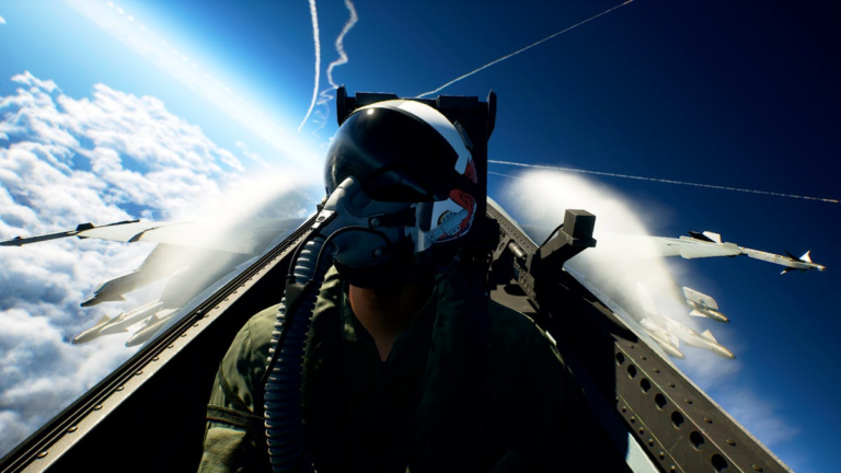 Ace Combat 8 Will Incorporate Dogfighting Tips From Real Jet Pilots In a screenshot is a pilot with mask on in the cockpit of a fighter jet with clouds and the horizon behind the jet.