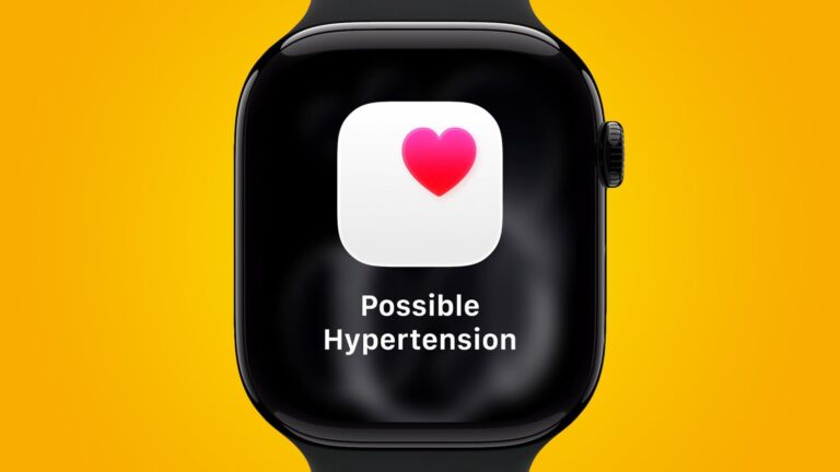 An Apple Watch displaying a hypertension alert in watchOS 26.